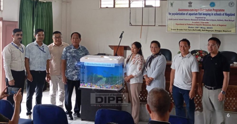 Additional Director of DoF&AR, Lotimenba with officials from ICARD-Central Inland Fisheries Research Institute, Kolkata and Department of Fisheries & Aquatic Resources, Nagaland during an ‘Awareness-cum-Input Distribution Programme’ held at Dimapur on May 29. (DIPR Photo)